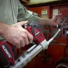 Alemite batteridriven smörjspruta 20V Li-Ion, 2 batt.